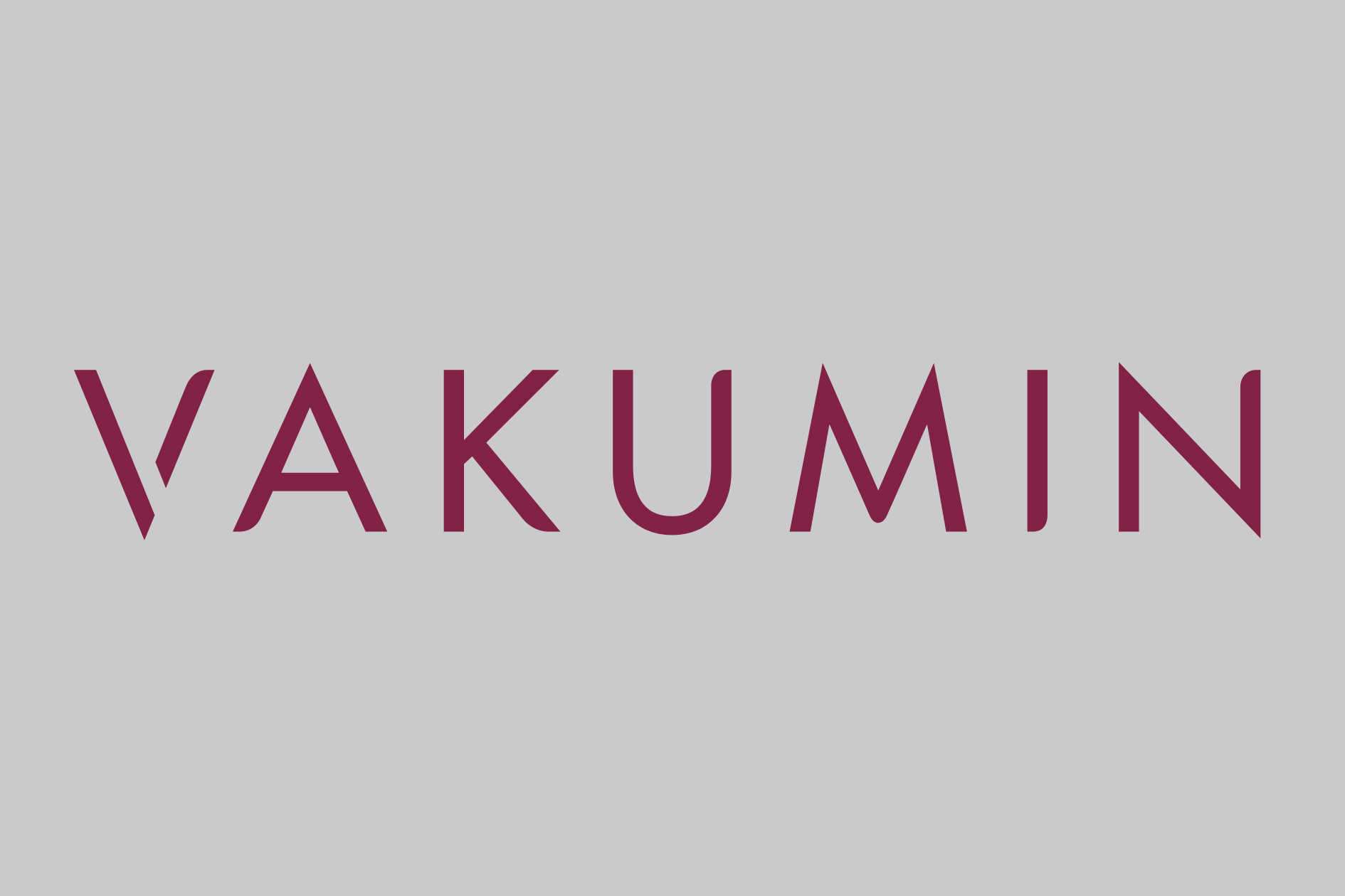 vakumin logo design